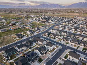 Aerial view of residential area featuring a mountain backdrop