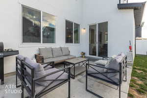 View of patio with outdoor furniture