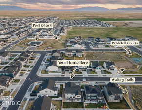 Aerial view at dusk of a residential view and a mountain view