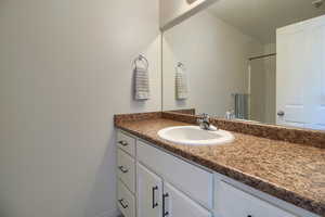 Full bathroom featuring vanity