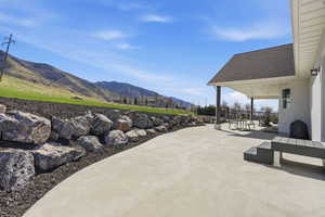 View of patio featuring a mountain view