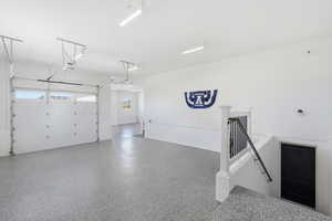 Extra-large 3rd car garage with separate basement entrance