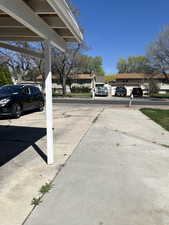 View of vehicle and RV parking featuring a residential view
