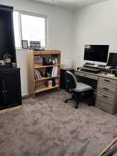 Office with dark carpet