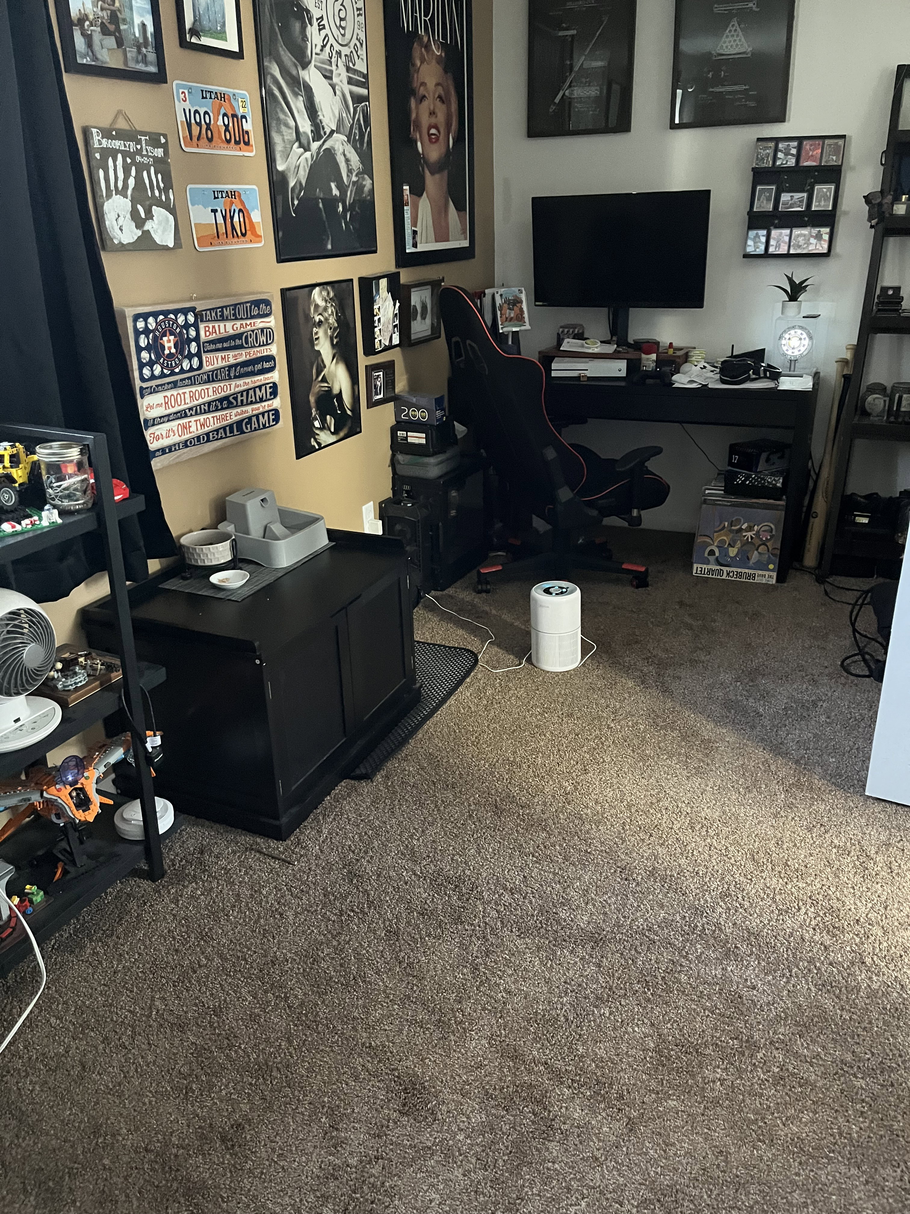 Large office/bedroom area featuring dark carpet
