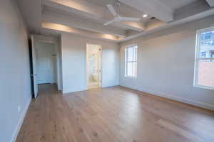 Unfurnished bedroom featuring crown molding, light wood-style flooring, ceiling fan, recessed lighting, and connected bathroom