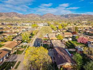 Aerial view of residential area with a mountain backdrop