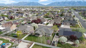 Aerial view of residential area with a mountain backdrop