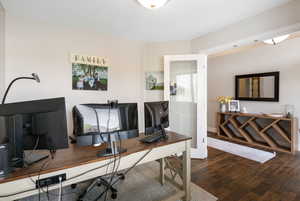 Office featuring wood finished floors