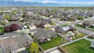 Aerial perspective of suburban area featuring a mountain backdrop