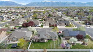 Aerial perspective of suburban area with a mountainous background