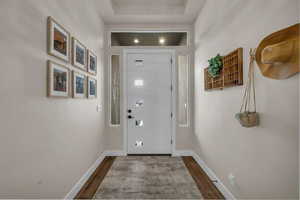 Doorway with wood finished floors
