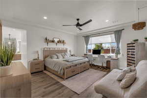 Bedroom featuring wood finished floors, ceiling fan, a desk, and recessed lighting