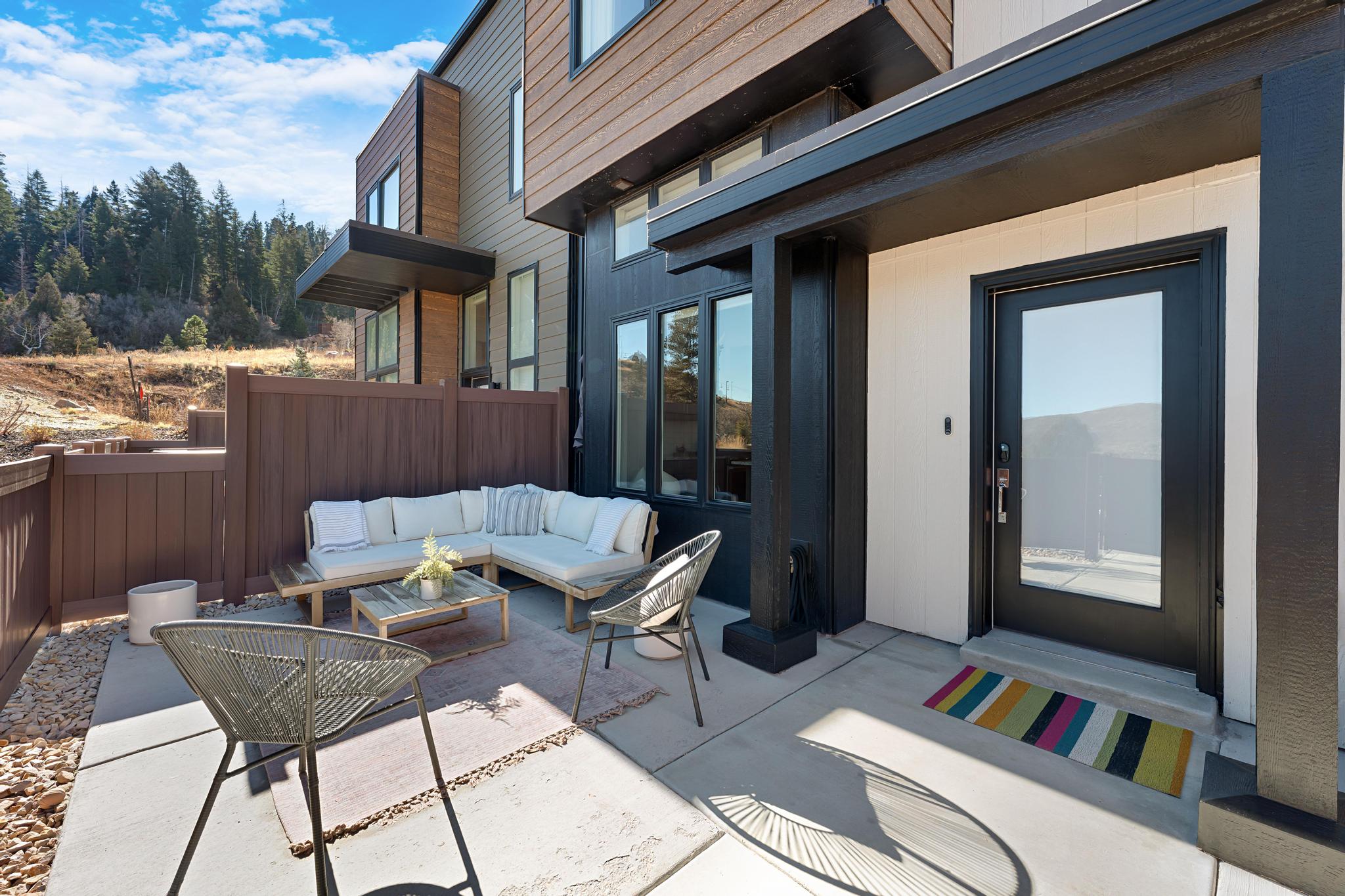 View of patio / terrace featuring an outdoor living space with a fire pit