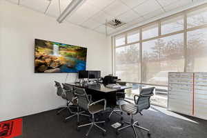 Home office featuring expansive windows