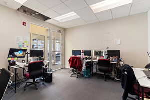 Office space featuring a drop ceiling