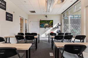 Home office with a paneled ceiling