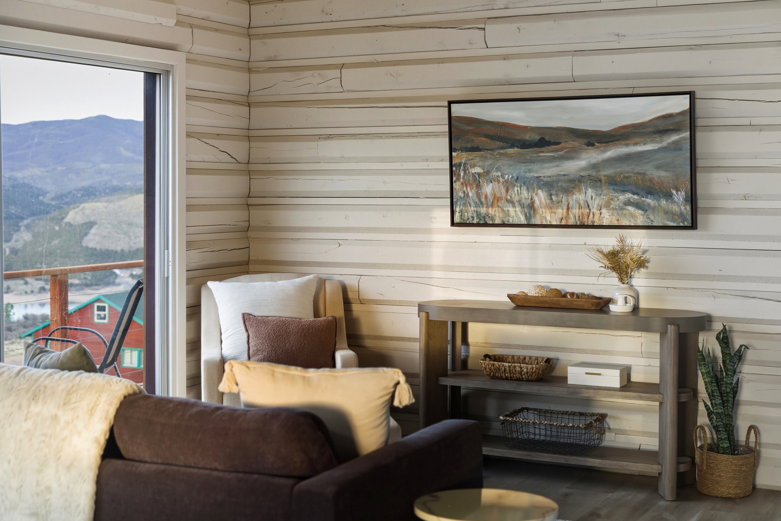 Living area featuring wood walls