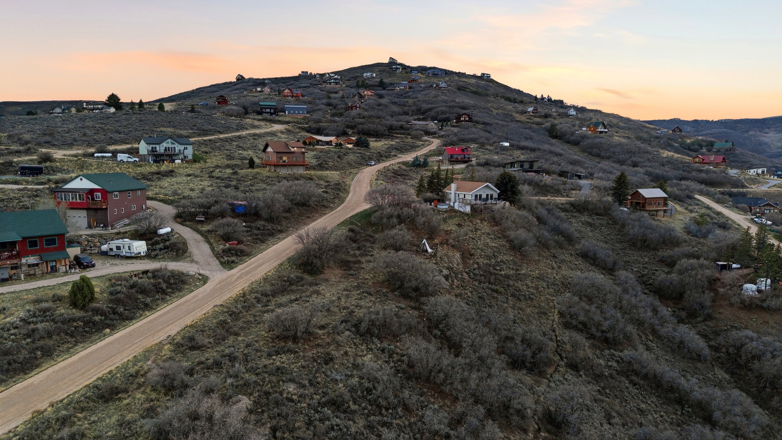 Aerial overview of property's location with mountains
