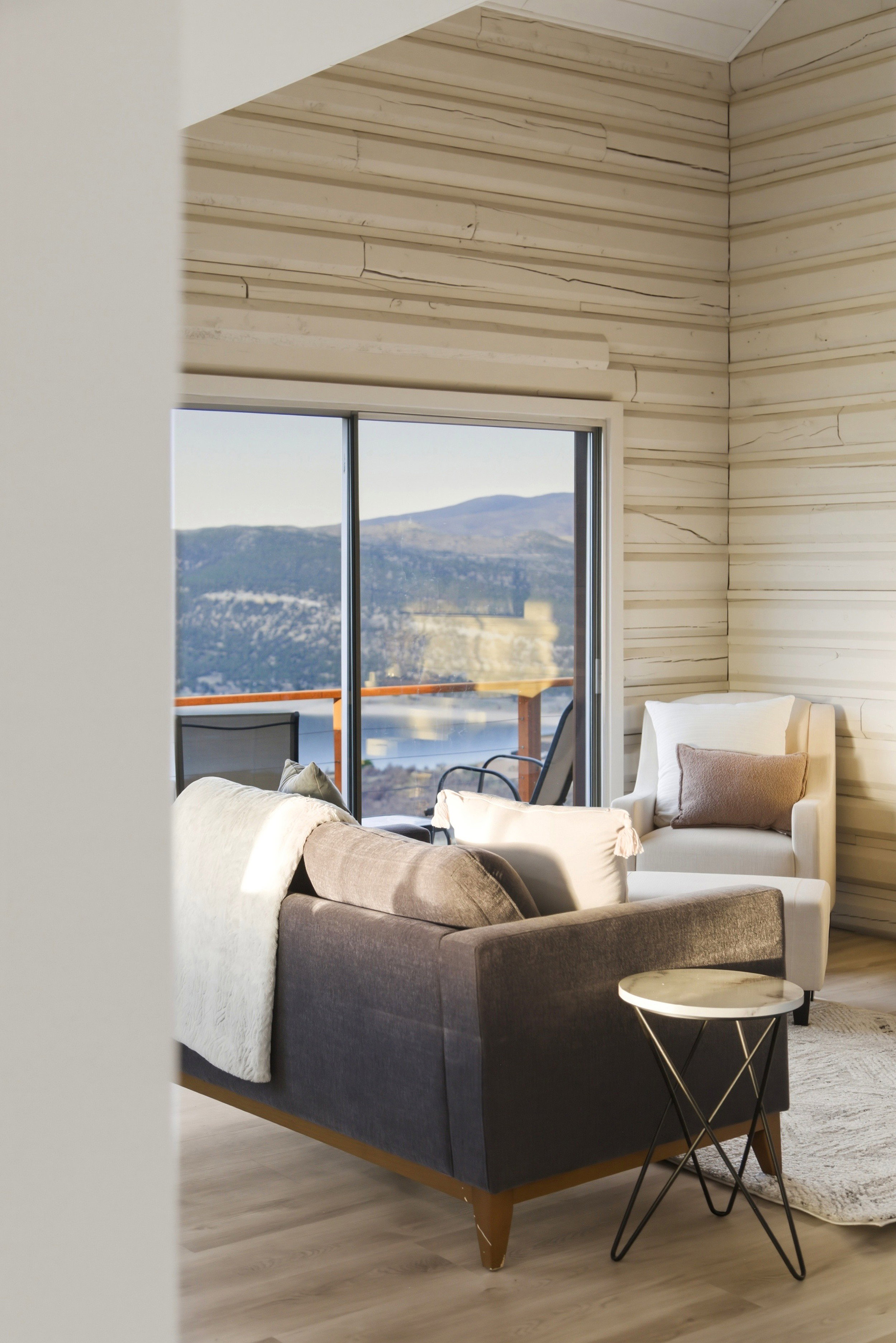 Living room with a mountain view and wood finished floors