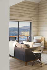 Living room with a mountain view and wood finished floors