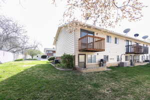 Rear view of house with a balcony