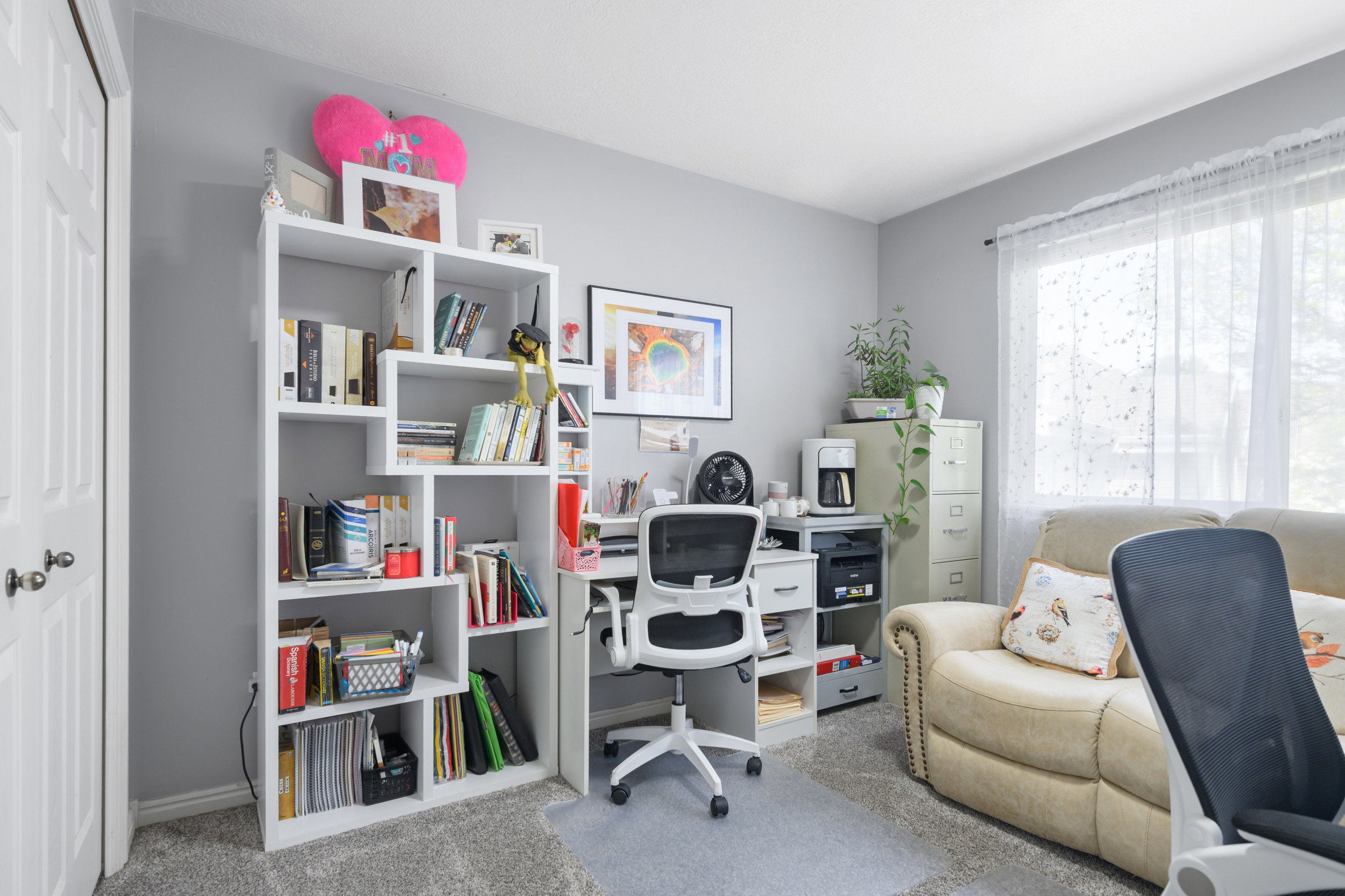 Office featuring light colored carpet and baseboards