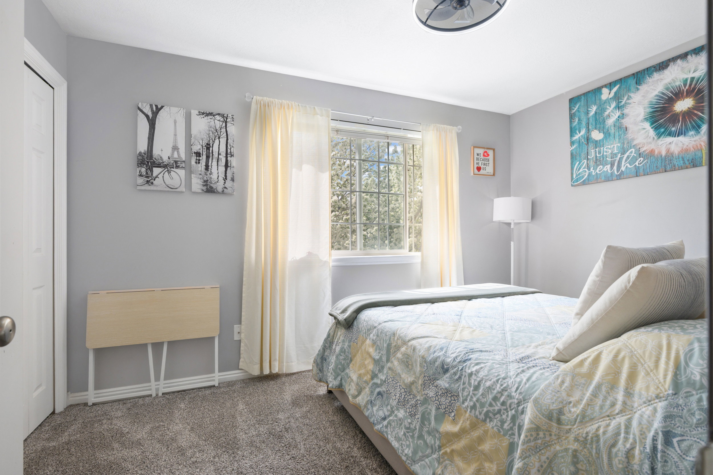 Bedroom with carpet flooring and baseboards