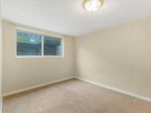 Bedroom down with big bright window