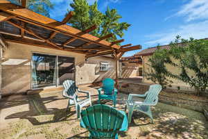 View of patio with a pergola