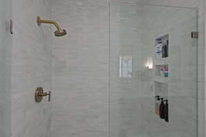 Full bath featuring a stall shower