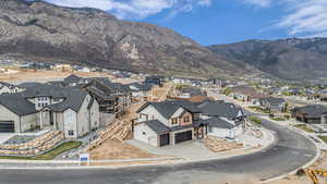 View of mountain backdrop with nearby suburban area