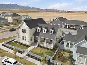 Aerial view of residential area with a mountainous background