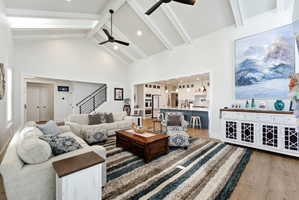 Living area featuring light wood-style floors, recessed lighting, and a ceiling fan
