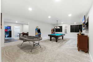 Game room featuring light carpet, billiards, and recessed lighting