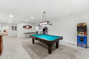 Game room with pool table, light carpet, and recessed lighting