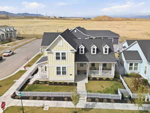 Aerial view of residential area with a mountainous background