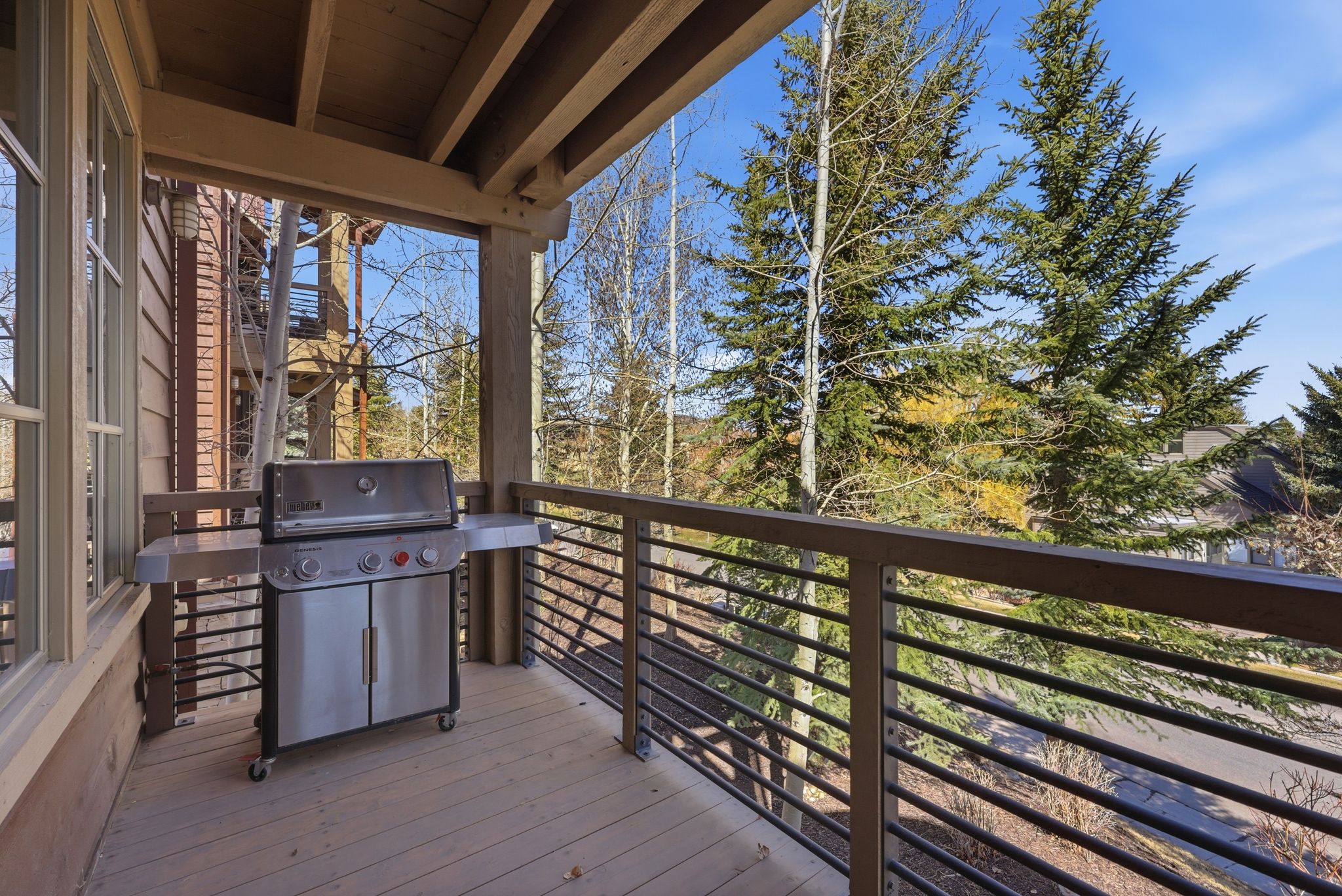 Wooden terrace with grilling area