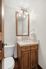 Bathroom featuring toilet and vanity