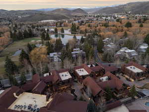 Aerial view at dusk of a water and mountain view