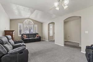 Main level living area with lots of natural light and large gathering spaces designed for comfortable everyday living.