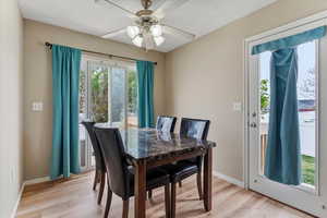 Dining area positioned within the functional layout, offering a comfortable space for everyday meals and gatherings with lots of natural light.
