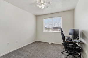 Additional bedroom on the main level offering flexible space within the home’s functional layout.