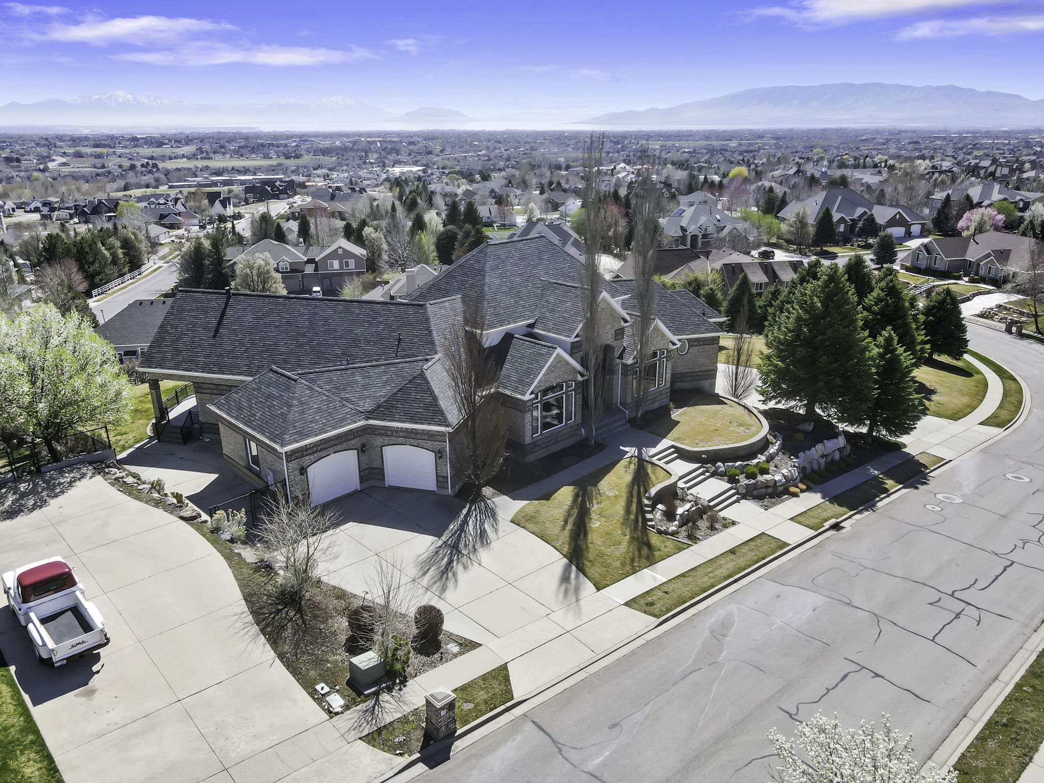 Aerial perspective of suburban area featuring mountains