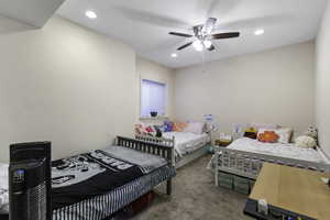 Bedroom featuring carpet flooring, recessed lighting, and a ceiling fan