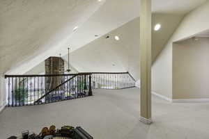Bonus room featuring light carpet, ceiling fan, and recessed lighting