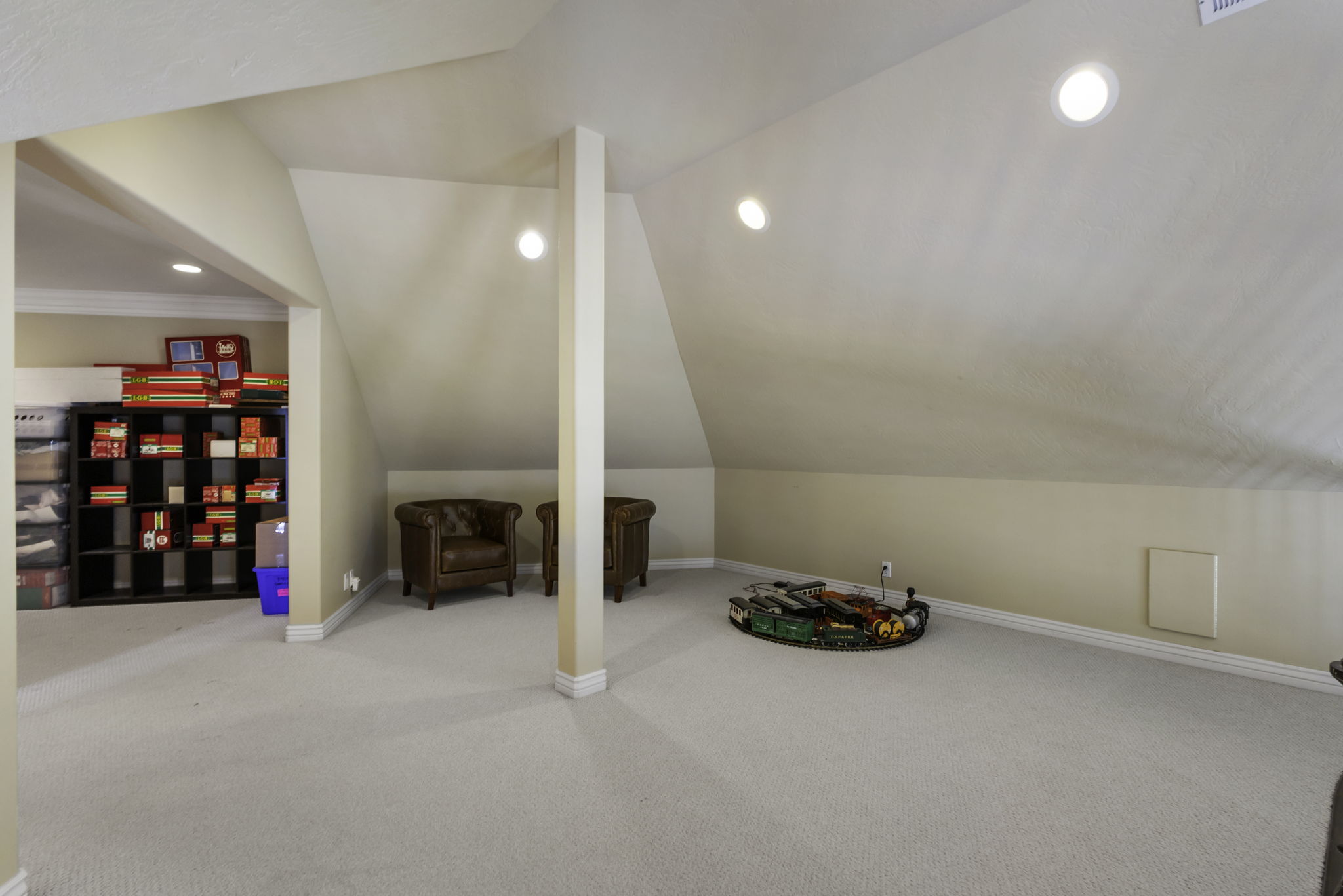 Game room featuring light colored carpet, recessed lighting, and vaulted ceiling