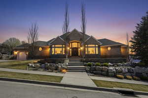 French provincial home featuring a garage