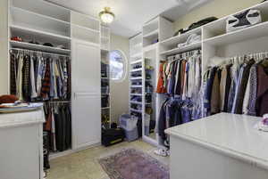 Walk in closet with attic access