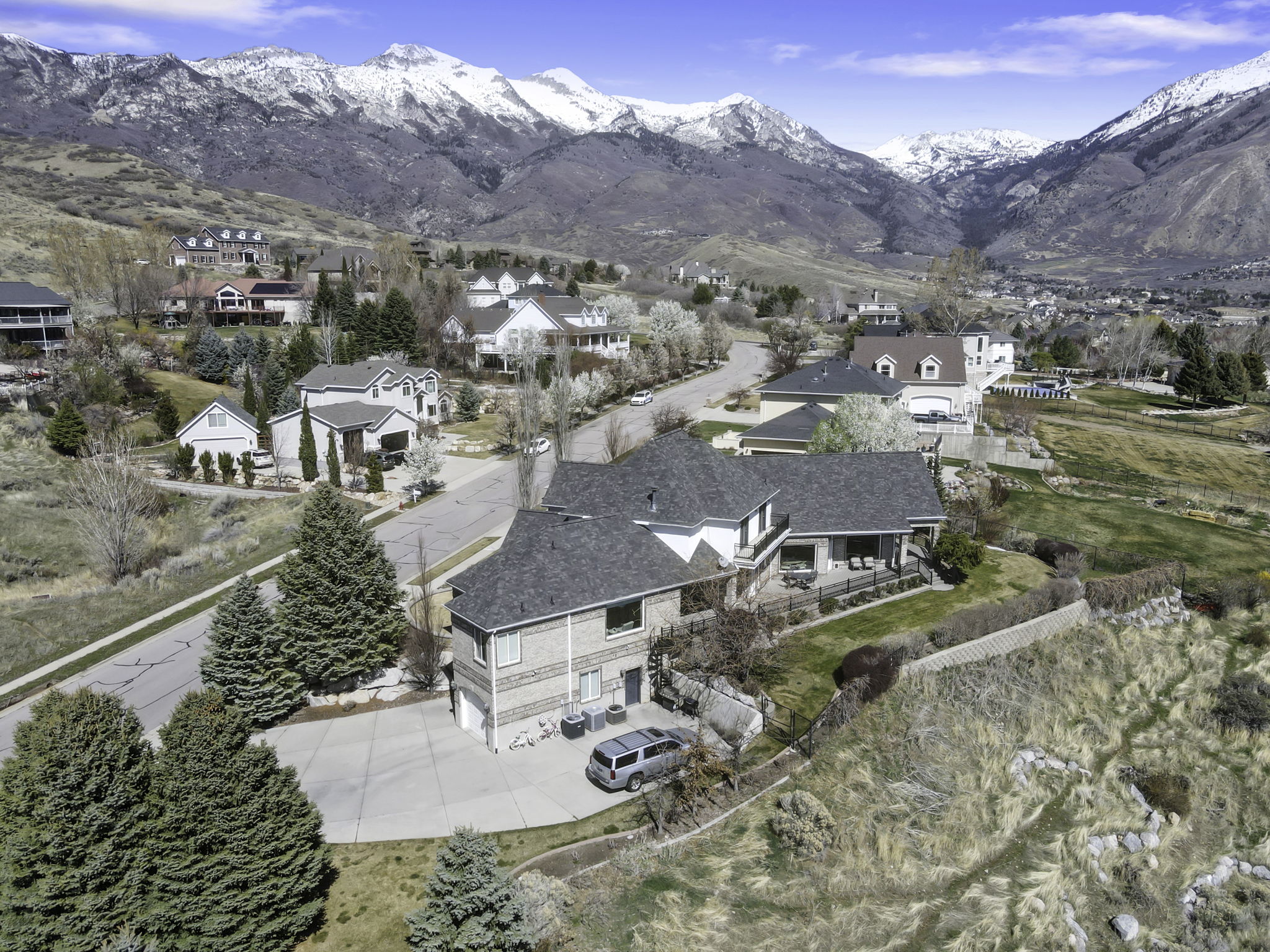 Aerial view of residential area featuring mountains